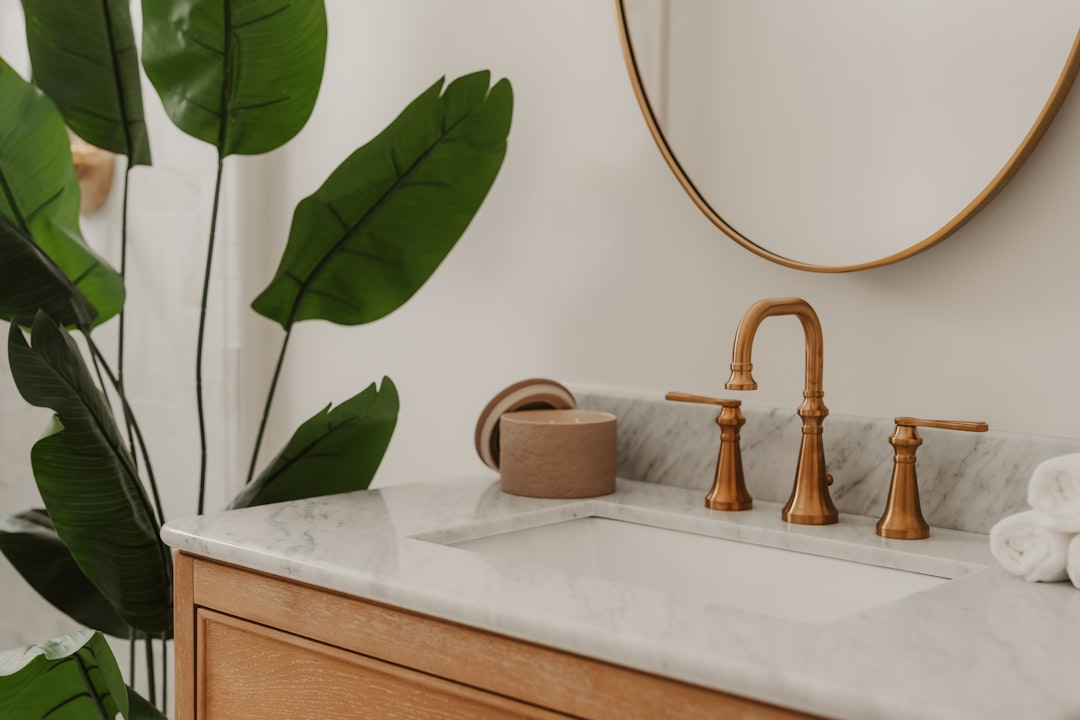 Marble bathroom with white linens